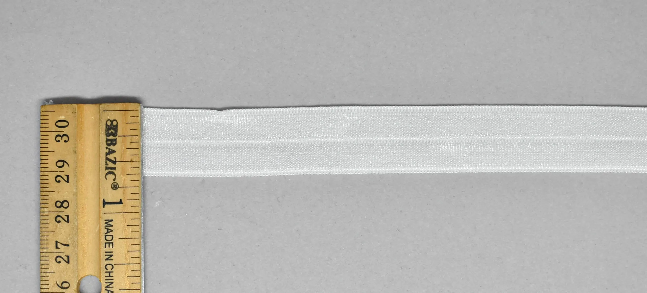 White Fold-Over Elastic (FOE) Trim