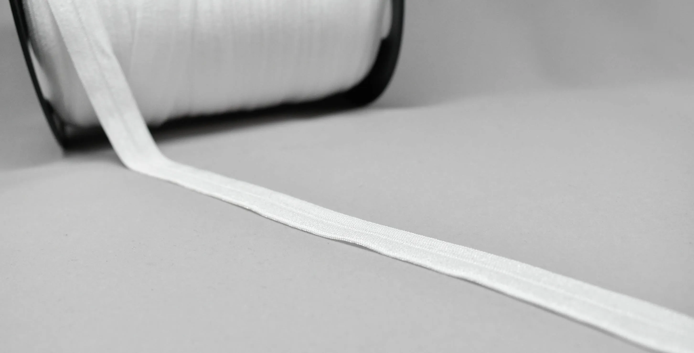 White Fold-Over Elastic (FOE) Trim